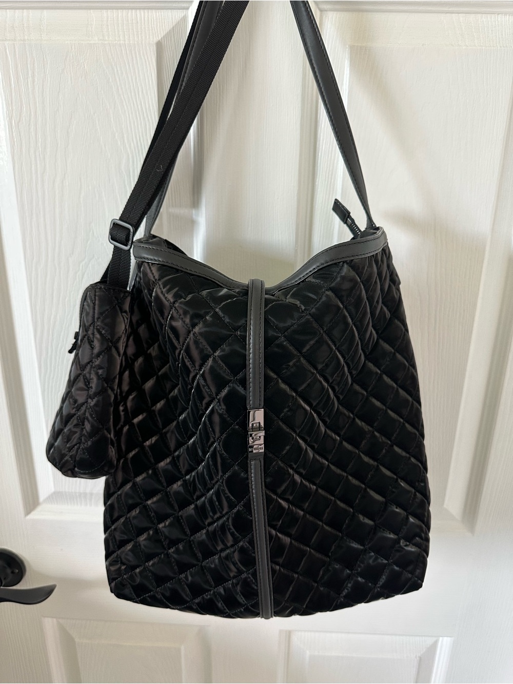 MZ Wallace black bag and phone carrier this is the lightest bag i have ever held